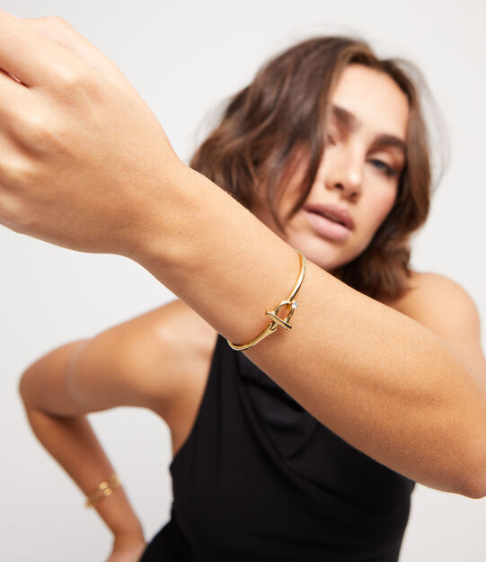 Pulsera con cierre frontal bañada en oro 18k con topacio blanco